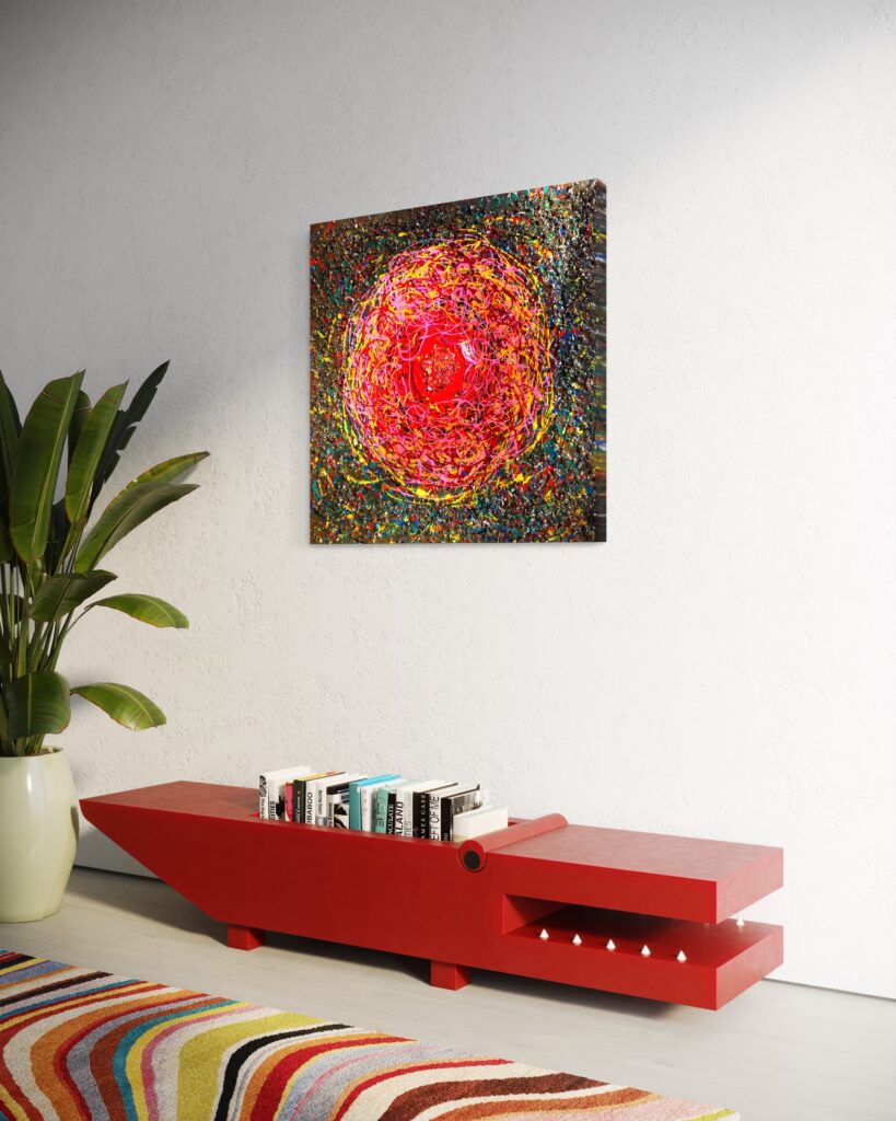 Colorful abstract circular painting on a white wall above a bold red low-profile cabinet with books, a plant, and a striped rug nearby.