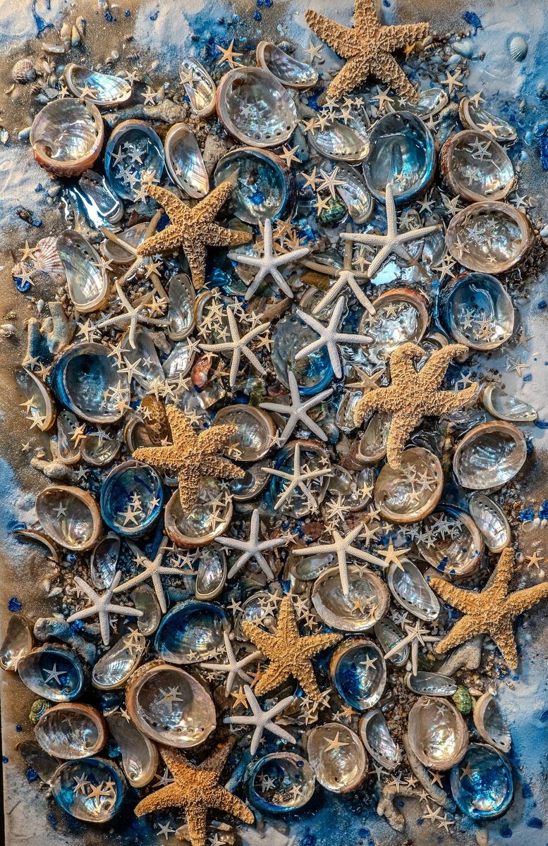 Sea Star by Kennith Maitland — mixed media resin painting filled with starfish and abalone shells.